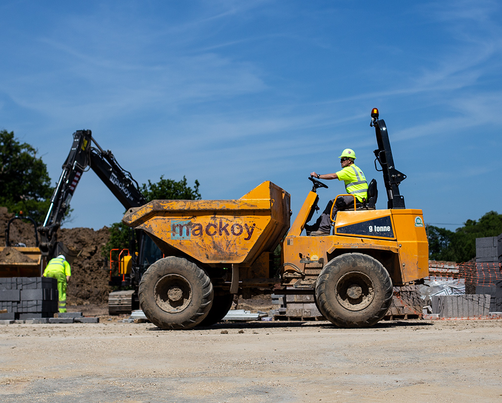 Mackoy Civil Engineering Dumper Driven on Site by Groundworks Operative