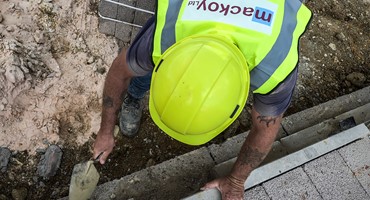 Groundworks Operative working on sub-structure birckwork for Mackoy Groundworks