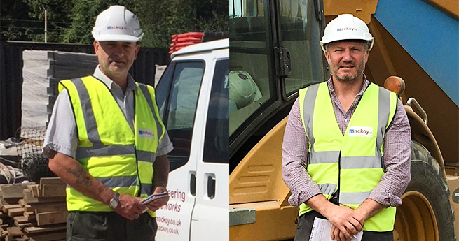 Mackoy SHEQ Manager and Advisor in Front of Branded Groundworks Plant Machinery